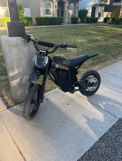 Tuttio Electric Dirt Bike — Sleek Black, Upgraded, Ready for Off‑Road Fun