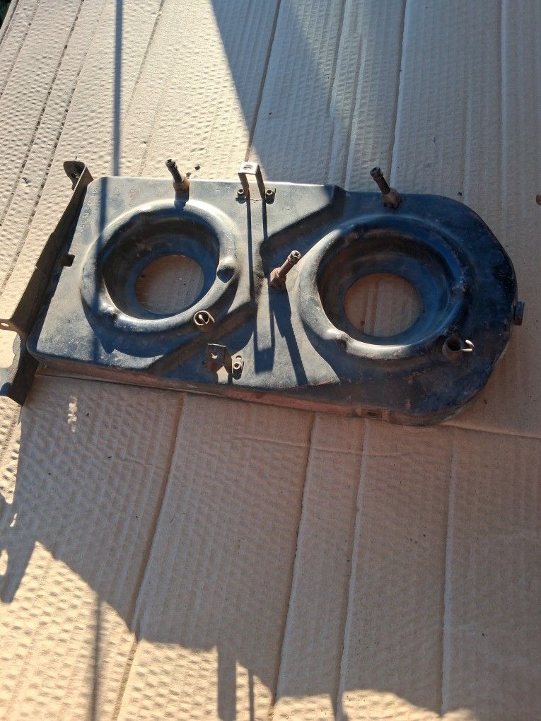1966 Chevelle. headlight bucket bracket left side.