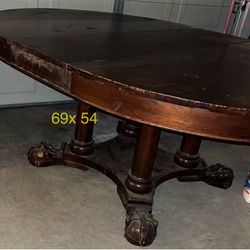 $150-Antique round table with leaf and 4 chairs (69x54 max)
