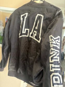 Size small but fits medium LA pink jacket