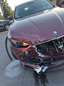 Maserati SUV with Front End Damage. Selling as is