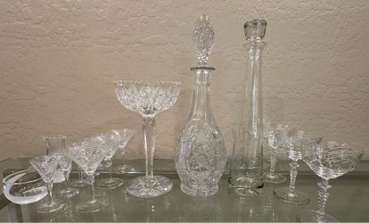 (17) pieces Assorted cut crystal. One brand includes Neiman Marcus and Bohemia Crystal, Tallest One 16”