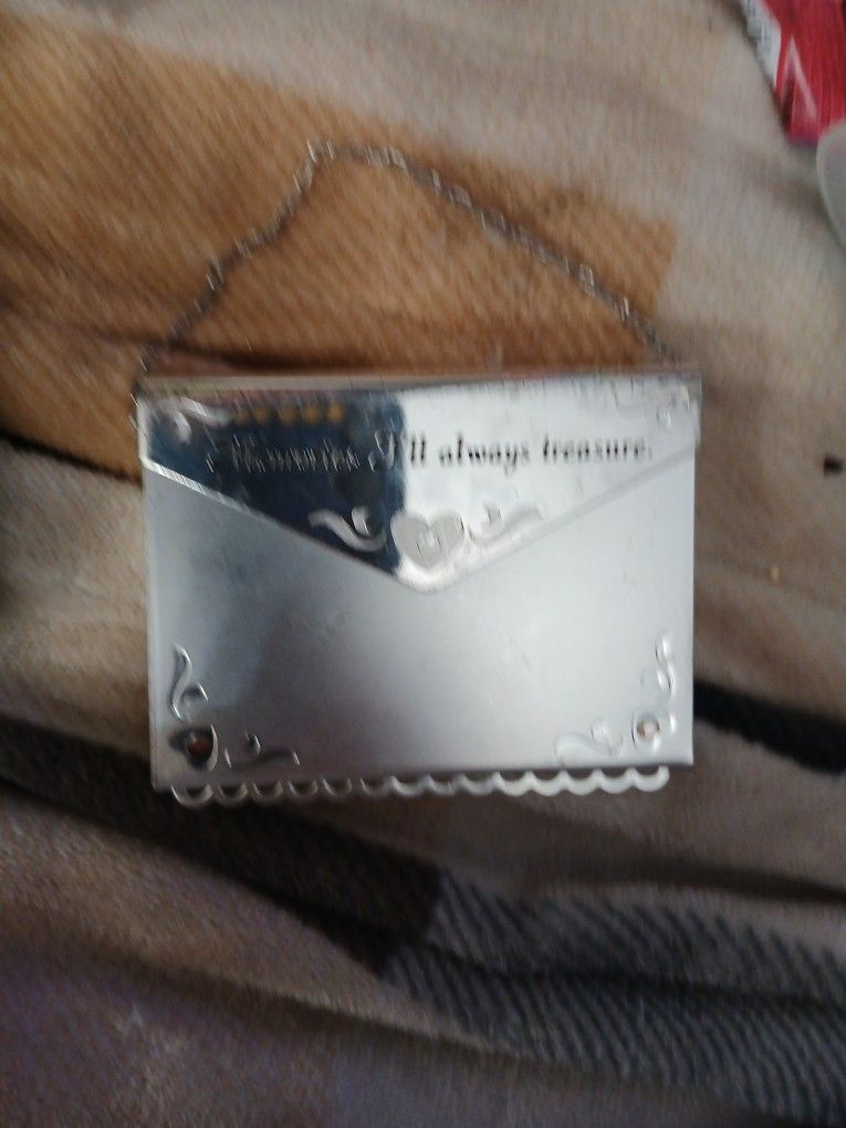 A Treasure Keepsake From There Parents.