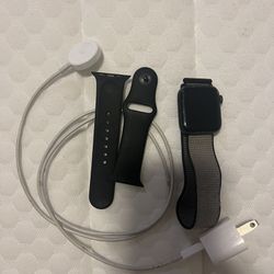 Apple Watch 4 Series With Extra Bracelet And The Charger