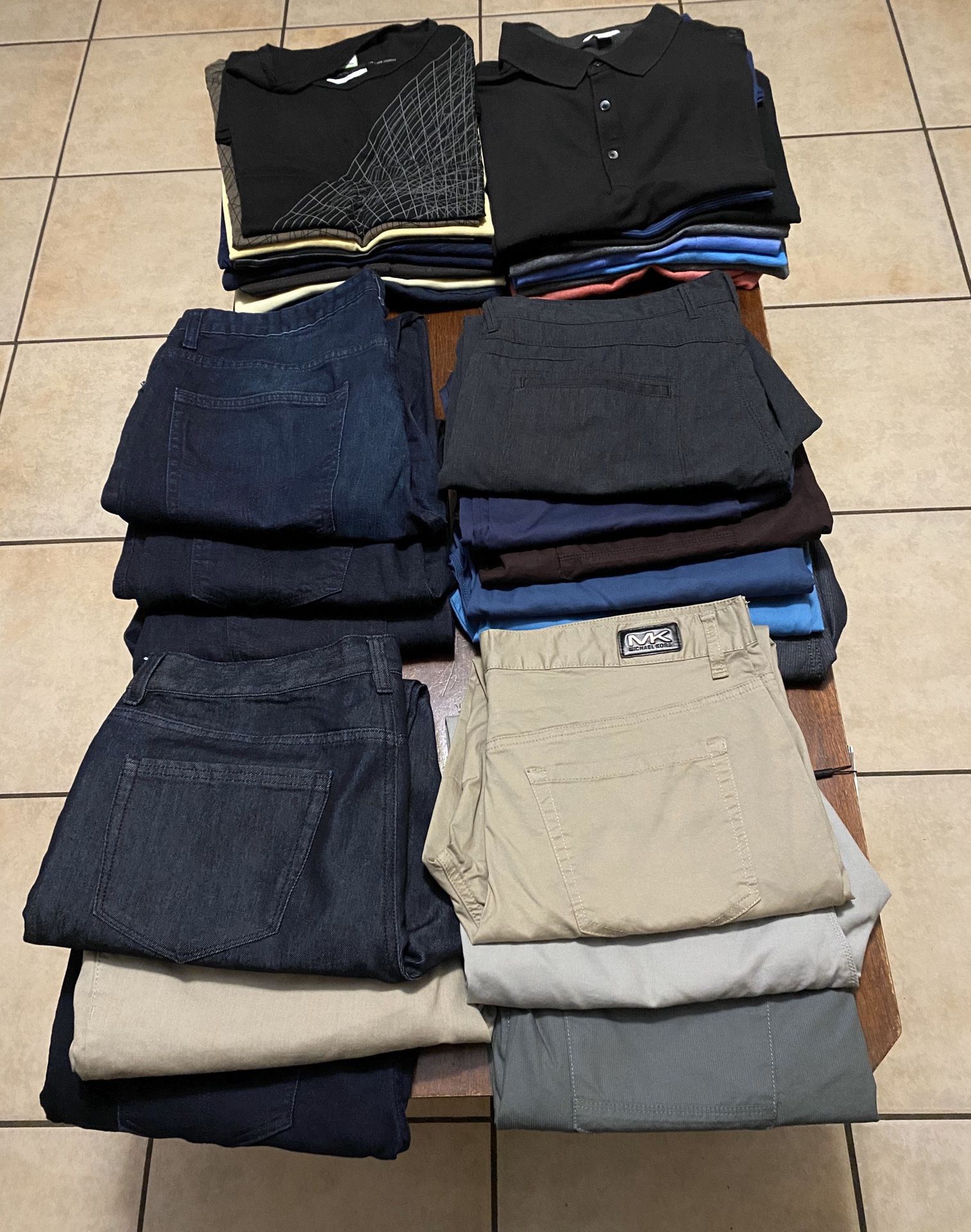 32 pieces calvin klein jeans and polos michael kors jeans and polos and calvin klein t shirts all jeans size 36x30 an 36x32 all polo shirts and t shi
