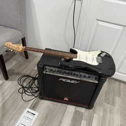 Squier Electric Guitar + Peavey Amp