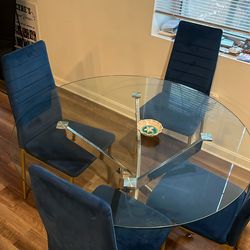 Glass Table With Blue Chairs
