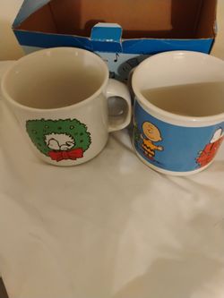 Vintage peanut Christmas cocoa mugs brand new okay and he