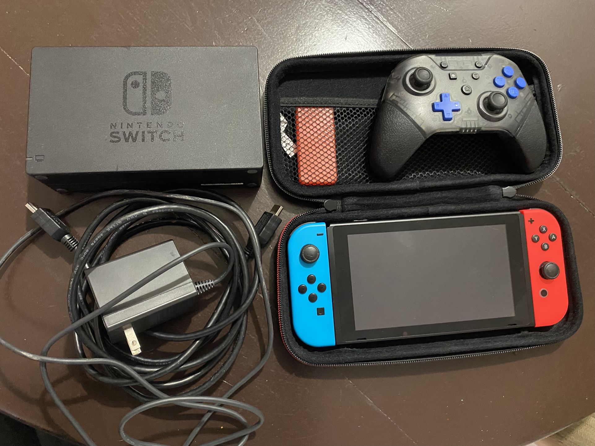 Nintendo Switch + Carrying Case and Wireless Controller