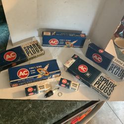 Vintage 1962 brand new old stock AC Fire Ring 45 spark plugs, 4 new full boxes of 8 in each and one box with 2 spark plugs, part # 1589493 Spin on gas