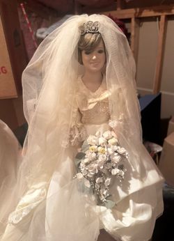 2 vintage bride dolls one is Princess Diana