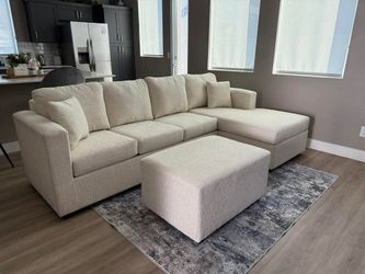 Brand New Cream Sectionals With Free Ottoman 
