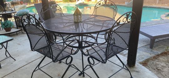 Vintage heavy rocking  chairs size 48” inch diameter chairs tabl