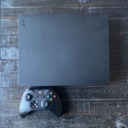 Xbox One X - 1TB Storage - Includes Xbox One X Controller & Rechargeable Battery for the Controller