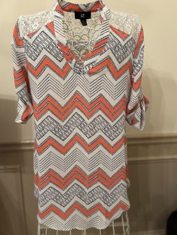 Iz Byer Orange and Black Chevron Blouse