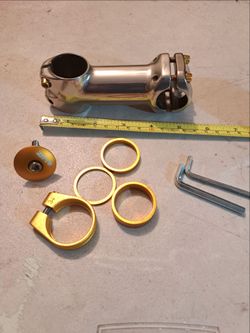 Bicycle stem and seat post clamp gold hardware