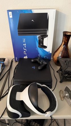 Ps4pro with psvr headset and games.