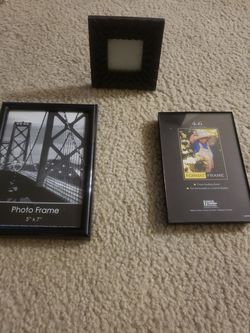 2 brand new and 1 used photo frames