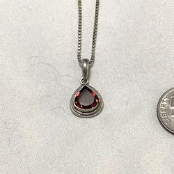 Vintage sterling silver necklace with dark red topaz