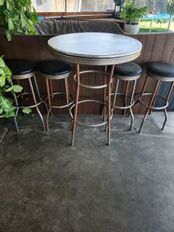 Table and bar stools