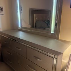 Dresser with lighted mirror 