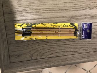 Paint brushes, paint palette & black ink