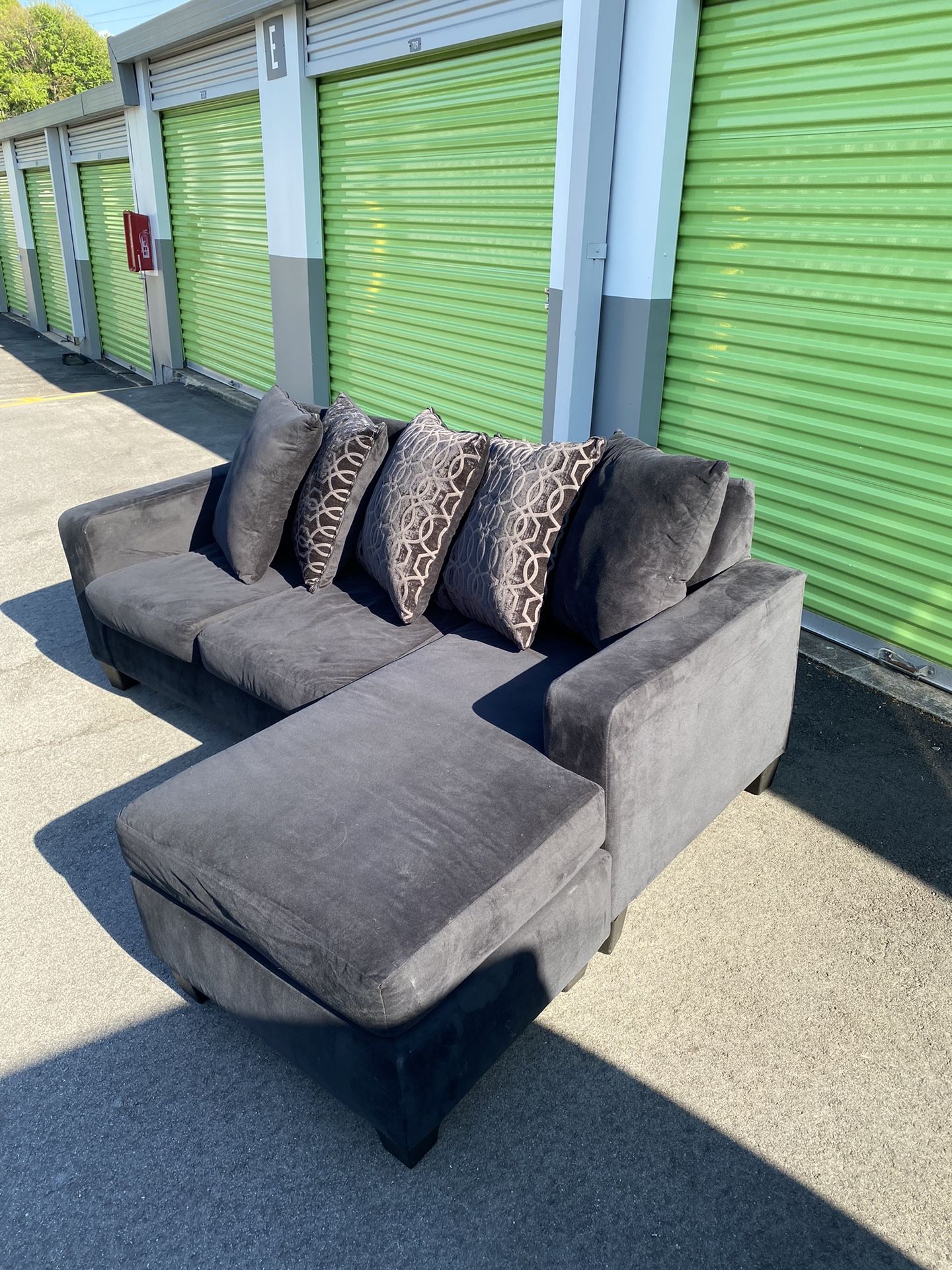 Free Delivery reversible, black sectional couch