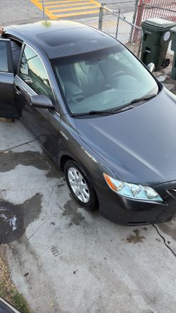 Toyota Camry 2007 4 cylinder  hybrid  salvaje title