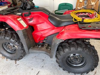 3- Honda  4-wheelers and trailer