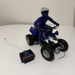 Polaris Outlaw ATV Remote Control (RC) vehicle with a rider and  Remote Untested