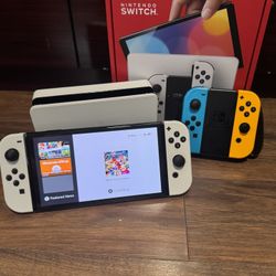 Nintendo Switch OLED extra controller plus 9 games
