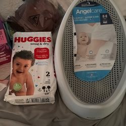 Baby Bath And Huggies Size 2.  Both Brand New.  