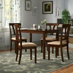 5 pc. Dining/Kitchen table set! Brand new still in the boxes! 