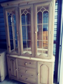 CHINA CABINET WITHOUT GLASS. SHELVES..ALSO THERE IS A BUFFET THAT COMES WITH THIS ITEM!!!