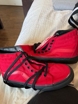 Woman’s red vans