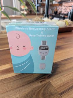 Potty training watch and alarm