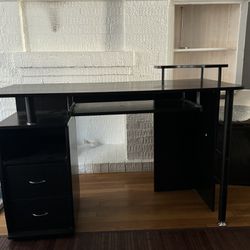 black office desk with drawers