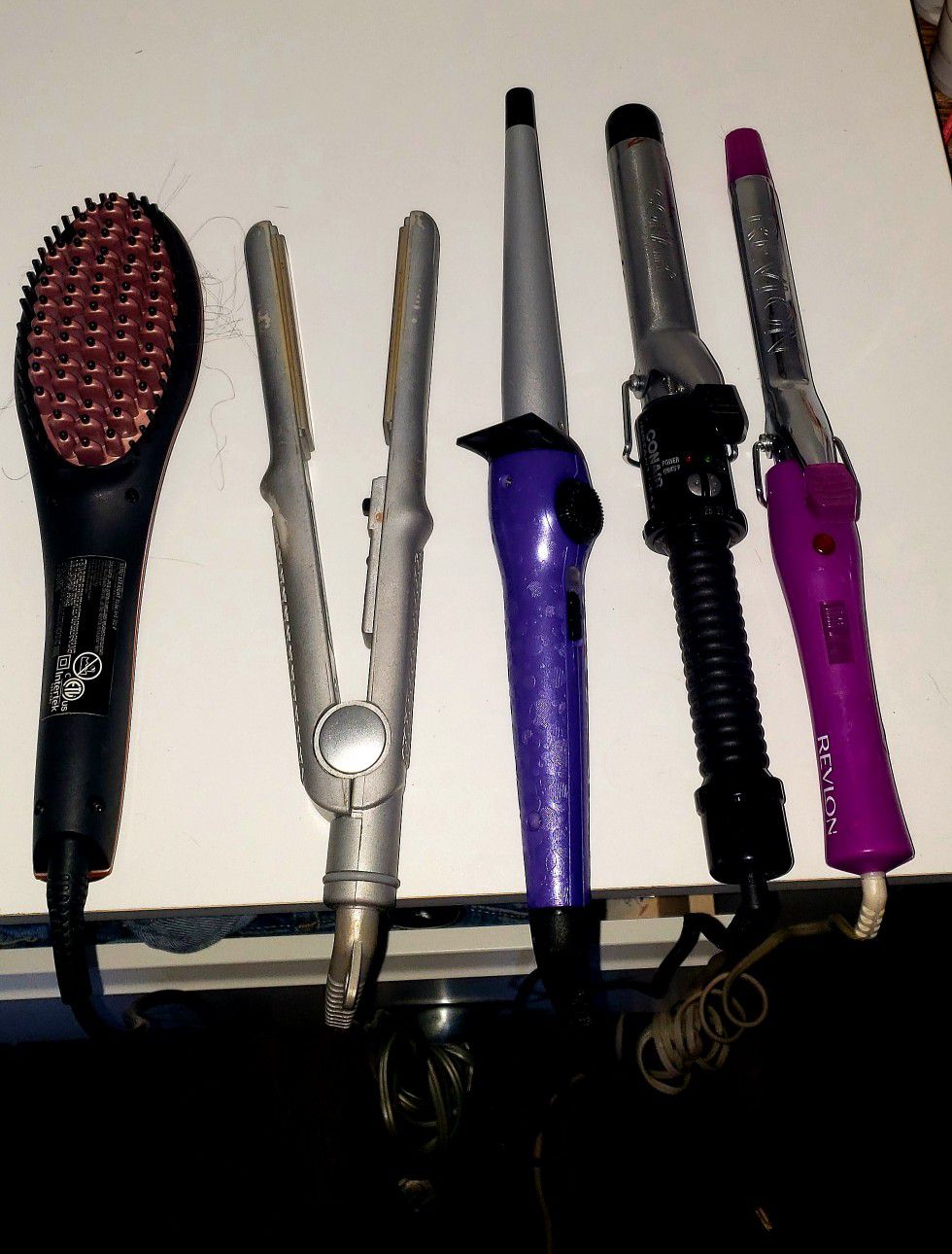 CURLING IRONS AND STRAIGHTENERS