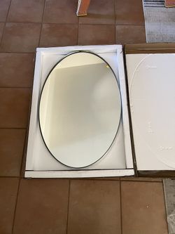 Chrome Oval Mirror 24”x 36”