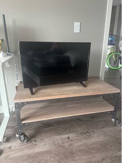 Industrial Rolling Coffee Table with Casters Estimated (WxDxH): 42 × 24 x 18 in