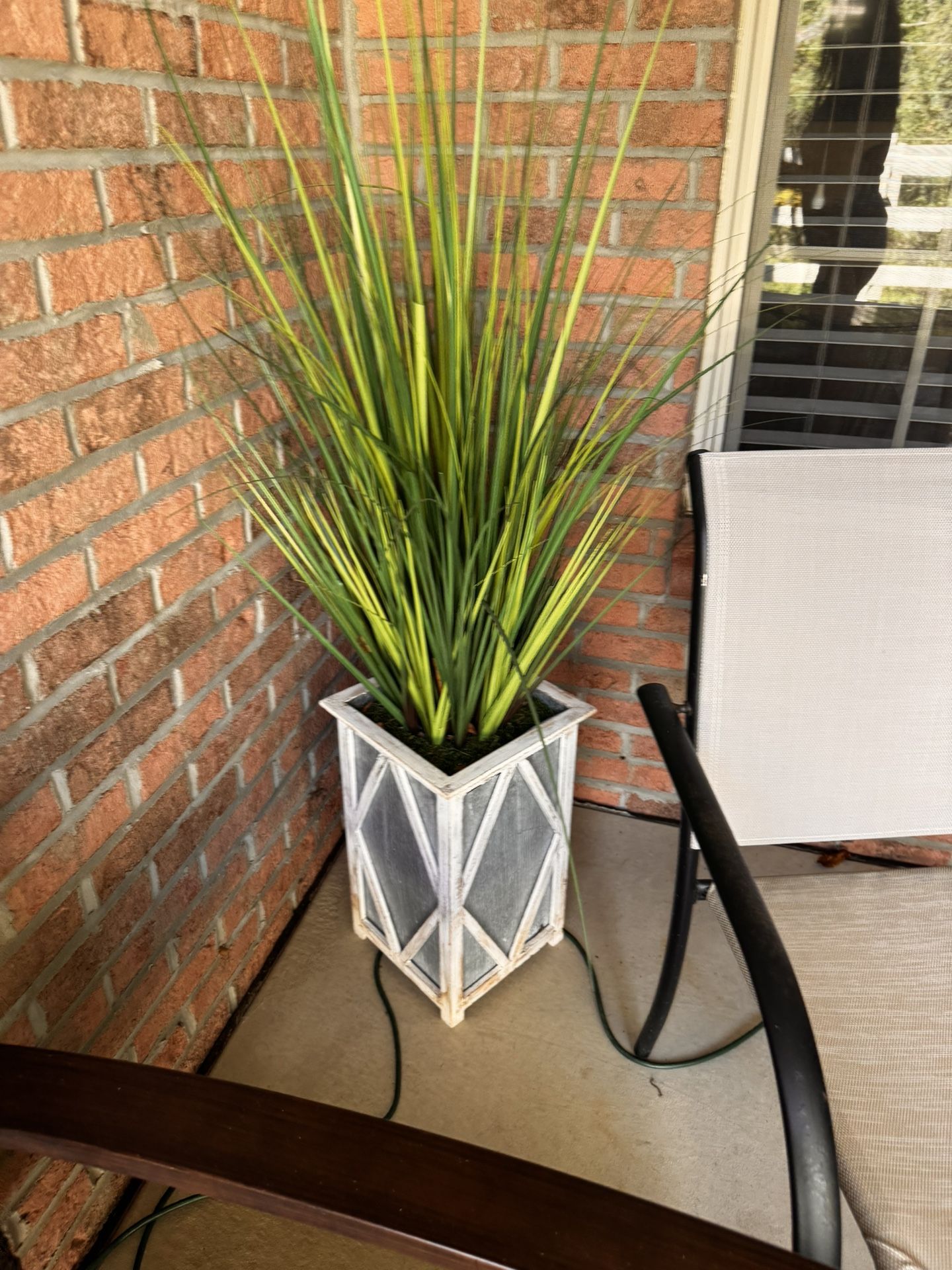 Outdoor Faux plant and planter used on covered porch