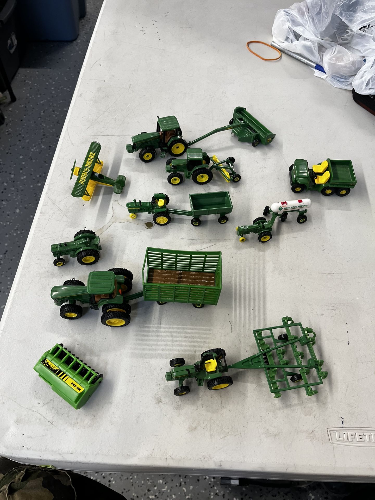 John Deere collectibles some metal some plastic
