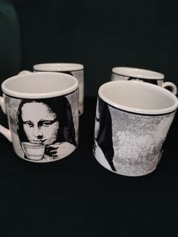 Mona Lisa cups 3 1/2 in tall. New set of 4.  $8