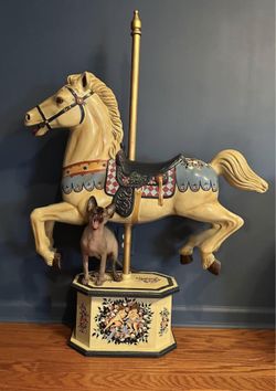 Vintage hand painted carousel horse with intricate details