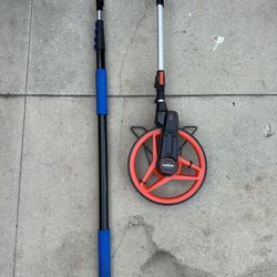 Measuring Wheel & Photo Pole 