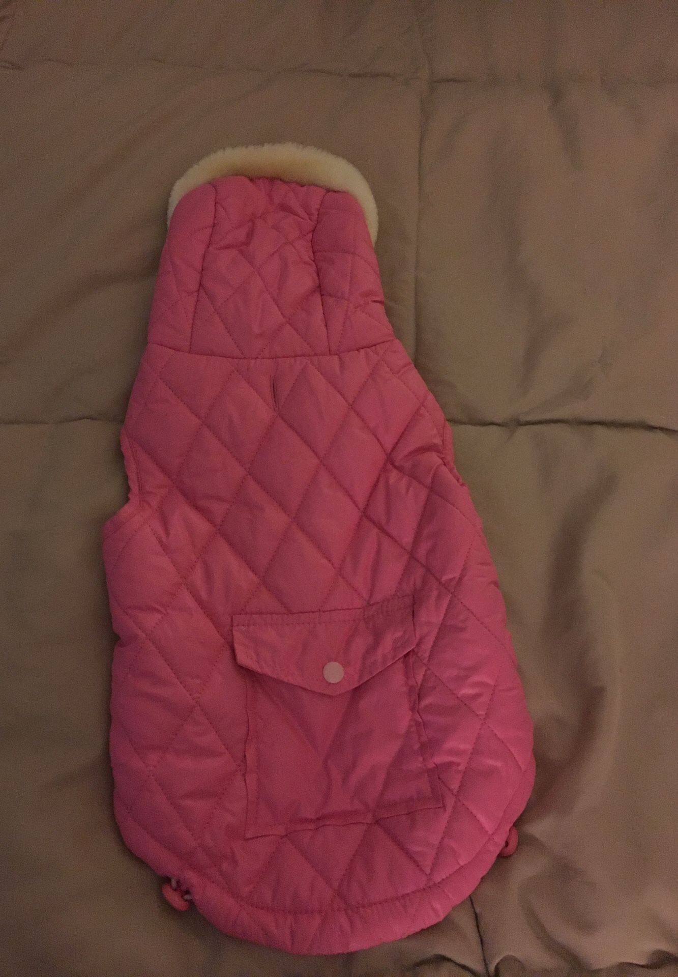 Dog coat . Waterproof. Name brand, pet central. Clean , no tears perfect for a medium size dog