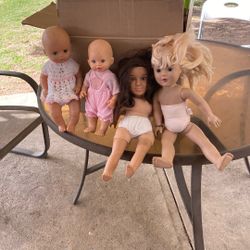 Four Dolls To Play And Comb There Hair.