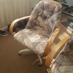 Biege dining table W/4 cloth chairs.      