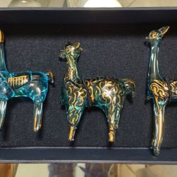 Vintage Peruvian Blue Glass Alpaca Figurine Features a Gold Leaf Overlay.