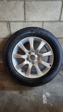 Toyo Proxes Tire on Silver OEM full size Alloy Wheel